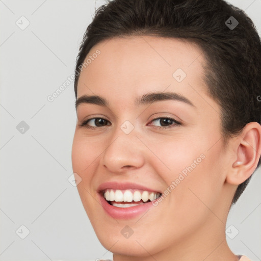 Joyful white young-adult female with short  brown hair and brown eyes