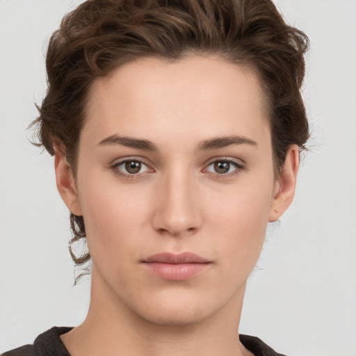 Neutral white young-adult female with short  brown hair and brown eyes