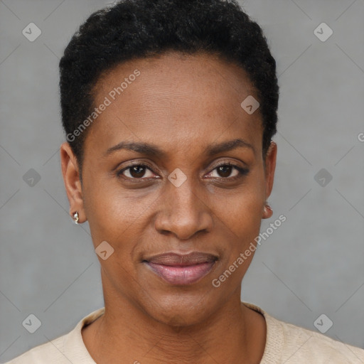 Joyful black adult female with short  brown hair and brown eyes