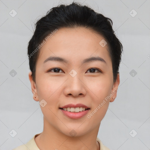 Joyful asian young-adult female with short  brown hair and brown eyes