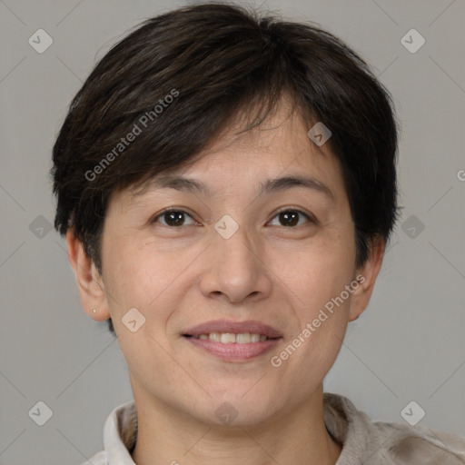 Joyful white adult female with short  brown hair and brown eyes