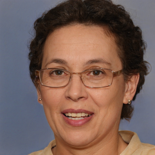 Joyful white middle-aged female with short  brown hair and brown eyes