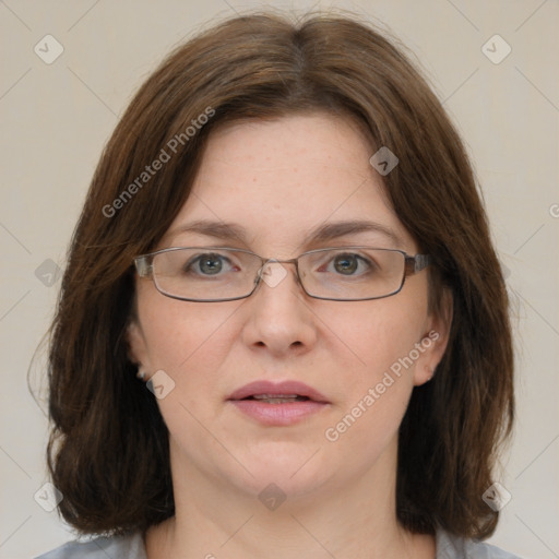 Joyful white young-adult female with medium  brown hair and green eyes