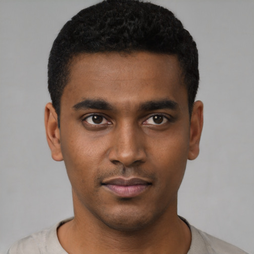 Neutral black young-adult male with short  black hair and brown eyes
