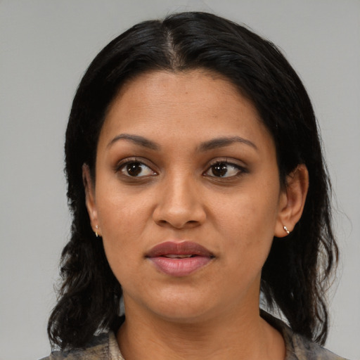 Joyful black young-adult female with medium  black hair and brown eyes