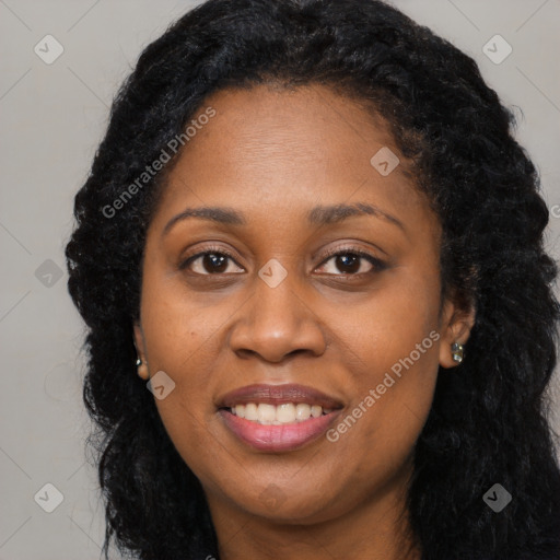 Joyful latino young-adult female with long  black hair and brown eyes