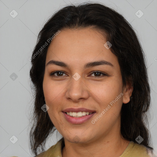 Joyful latino young-adult female with medium  brown hair and brown eyes