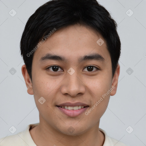 Joyful asian young-adult male with short  brown hair and brown eyes