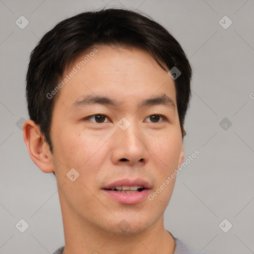 Neutral asian young-adult male with short  brown hair and brown eyes