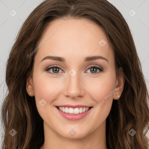 Joyful white young-adult female with long  brown hair and green eyes