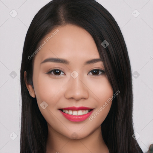 Joyful white young-adult female with long  black hair and brown eyes