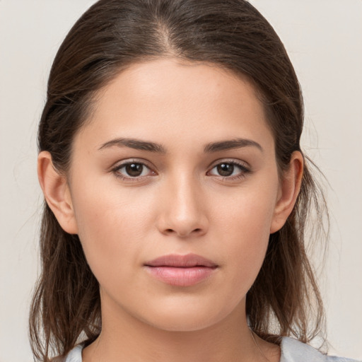 Neutral white young-adult female with medium  brown hair and brown eyes