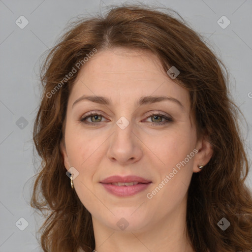 Joyful white young-adult female with long  brown hair and green eyes