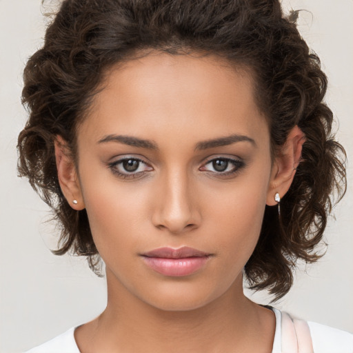 Neutral white young-adult female with medium  brown hair and brown eyes