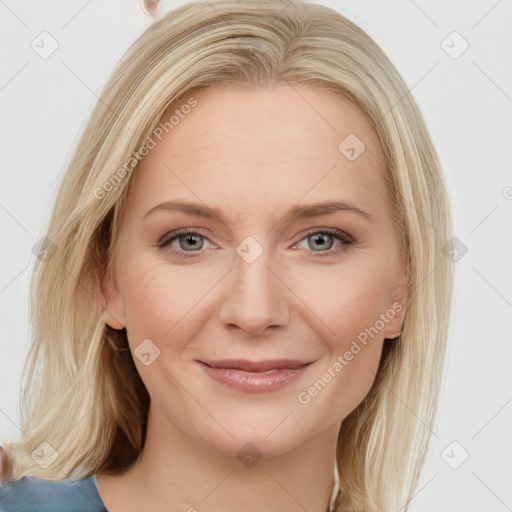 Joyful white young-adult female with medium  brown hair and blue eyes