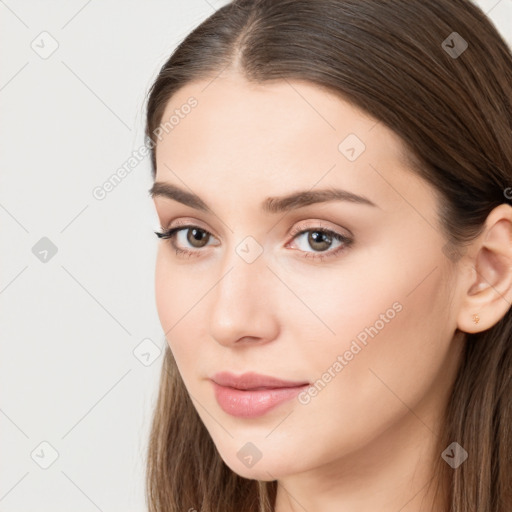 Neutral white young-adult female with long  brown hair and brown eyes