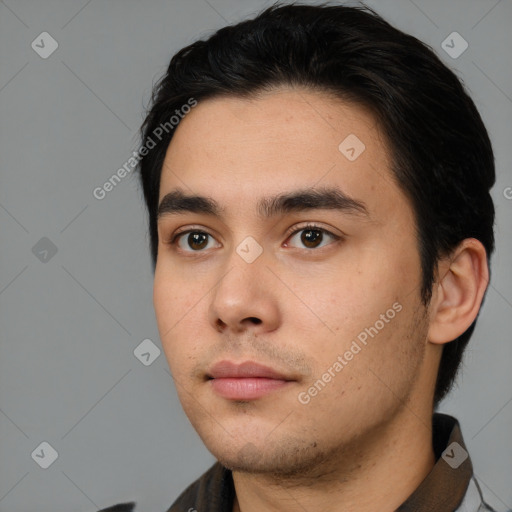 Neutral white young-adult male with short  black hair and brown eyes