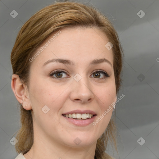 Joyful white young-adult female with medium  brown hair and blue eyes