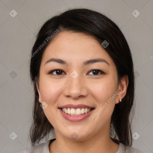 Joyful white young-adult female with medium  brown hair and brown eyes