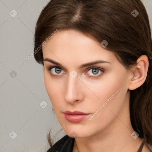 Neutral white young-adult female with medium  brown hair and brown eyes