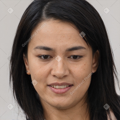 Joyful asian young-adult female with long  brown hair and brown eyes