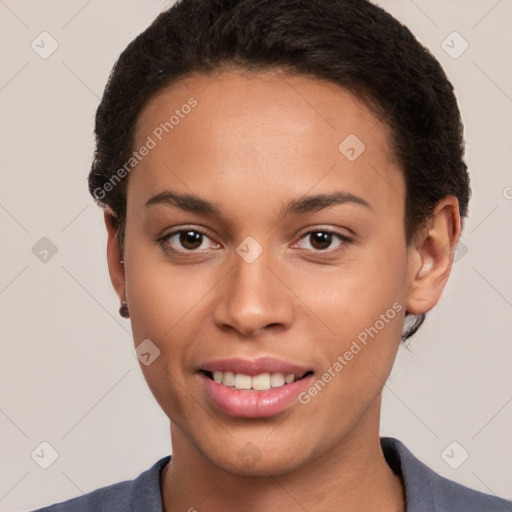 Joyful white young-adult female with short  brown hair and brown eyes