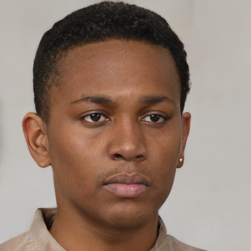 Neutral black young-adult male with short  brown hair and brown eyes