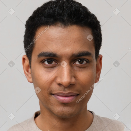 Joyful black young-adult male with short  black hair and brown eyes