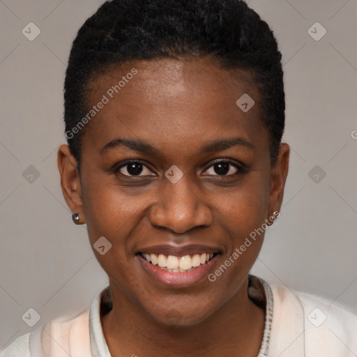 Joyful black young-adult female with short  black hair and brown eyes