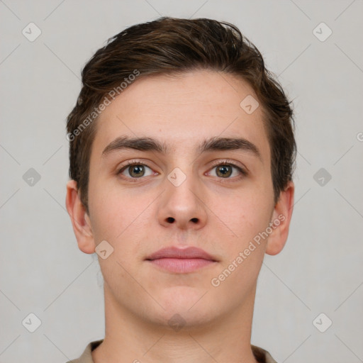 Neutral white young-adult male with short  brown hair and brown eyes