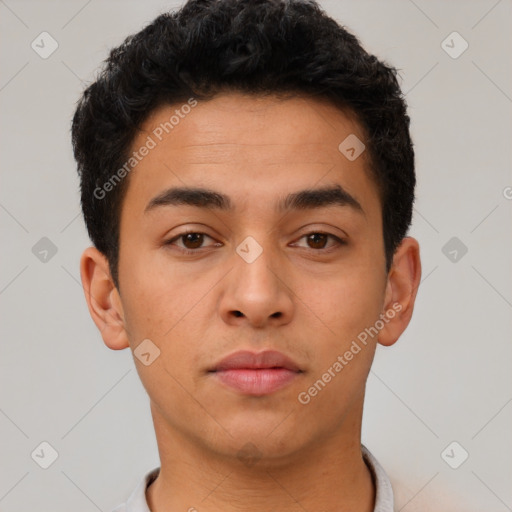 Neutral latino young-adult male with short  brown hair and brown eyes