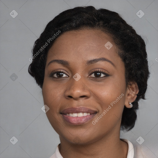 Joyful black young-adult female with medium  black hair and brown eyes