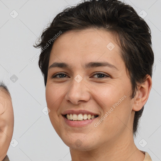 Joyful white young-adult female with short  brown hair and brown eyes