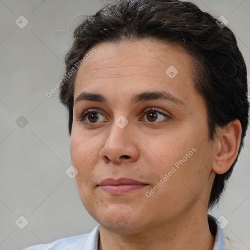 Joyful white adult female with short  brown hair and brown eyes