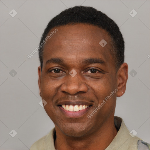 Joyful latino adult male with short  black hair and brown eyes