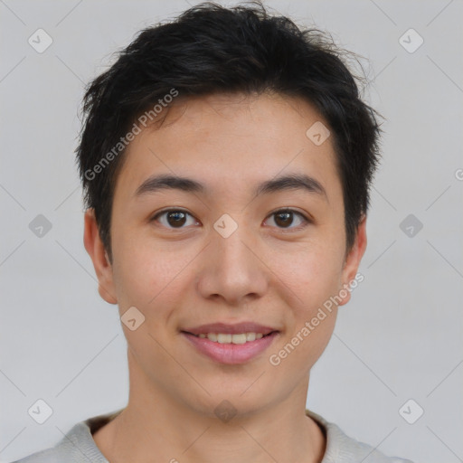 Joyful asian young-adult male with short  brown hair and brown eyes