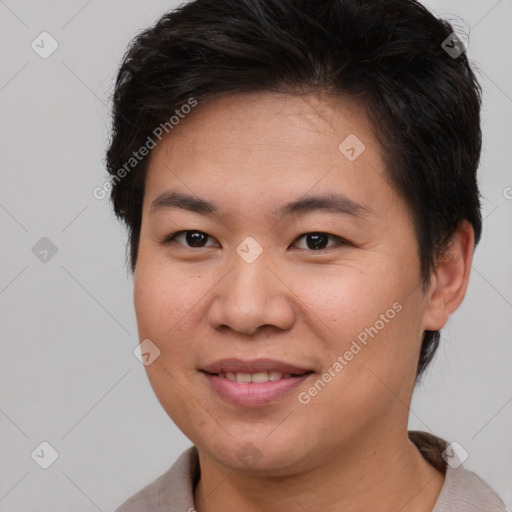 Joyful asian young-adult female with short  brown hair and brown eyes