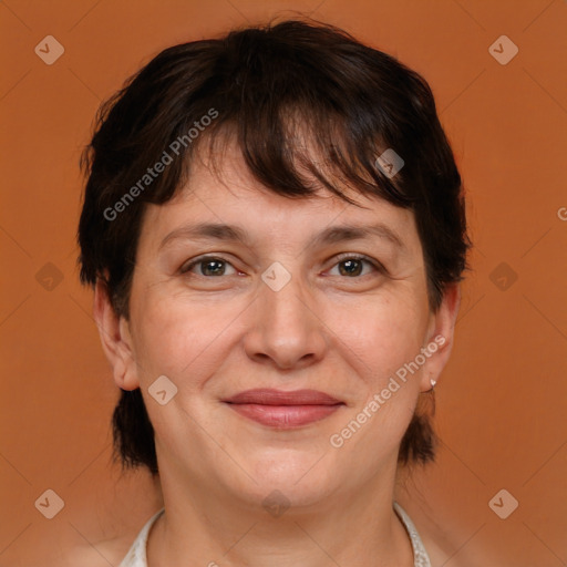 Joyful white adult female with medium  brown hair and brown eyes