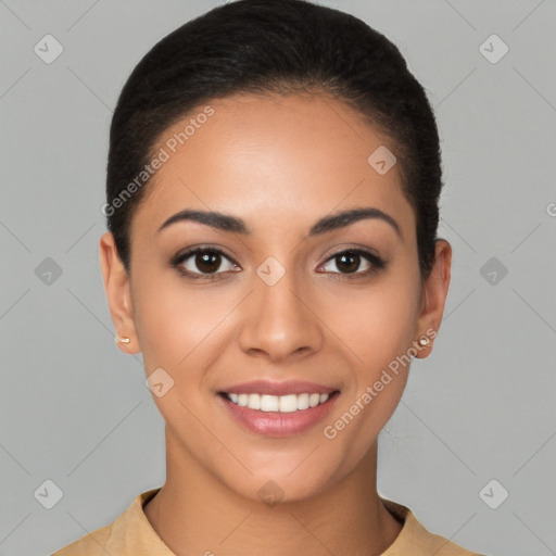 Joyful latino young-adult female with short  brown hair and brown eyes