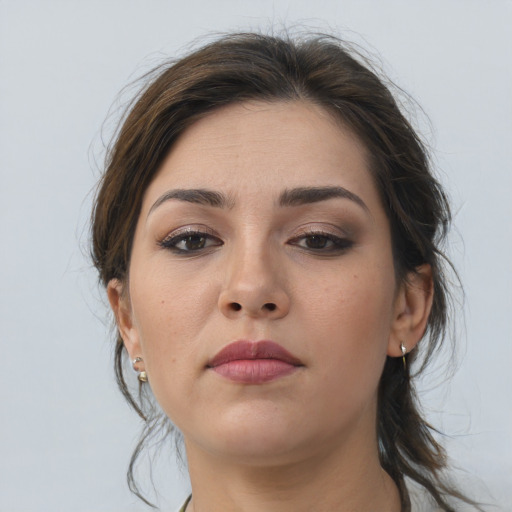 Neutral white young-adult female with medium  brown hair and brown eyes