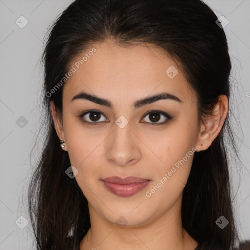 Joyful latino young-adult female with long  brown hair and brown eyes