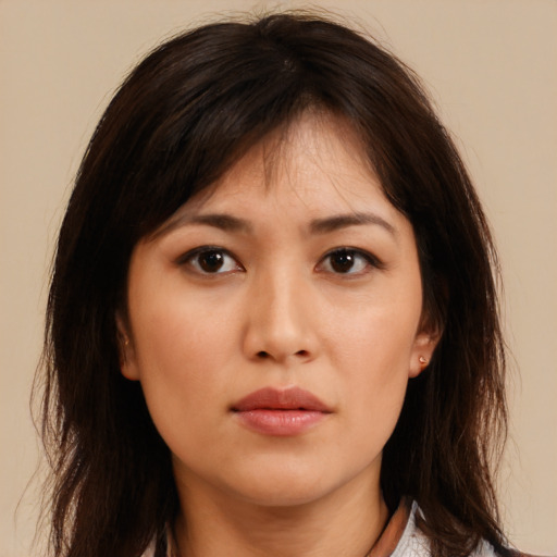 Neutral asian young-adult female with medium  brown hair and brown eyes