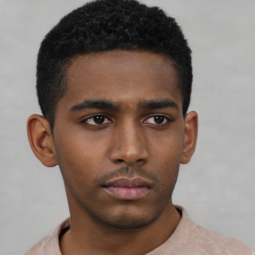 Neutral black young-adult male with short  black hair and brown eyes