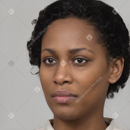 Neutral black young-adult female with short  black hair and brown eyes