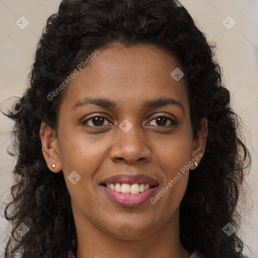 Joyful black young-adult female with long  brown hair and brown eyes