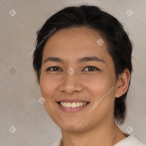 Joyful white young-adult female with medium  brown hair and brown eyes