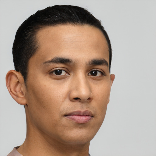 Neutral latino young-adult male with short  brown hair and brown eyes