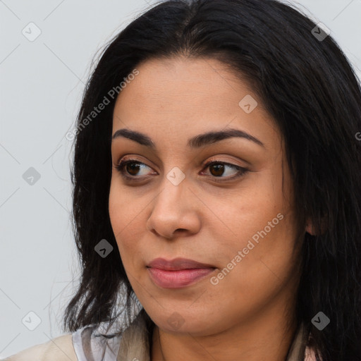 Joyful asian young-adult female with long  brown hair and brown eyes