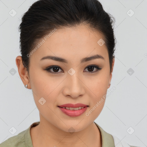 Joyful asian young-adult female with short  brown hair and brown eyes