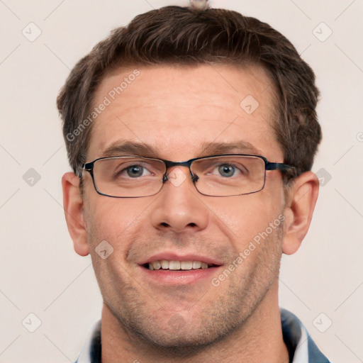 Joyful white adult male with short  brown hair and grey eyes